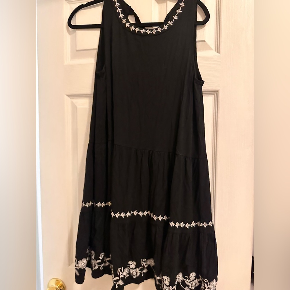 Black dress with embroidered design - tie in the back. Size M